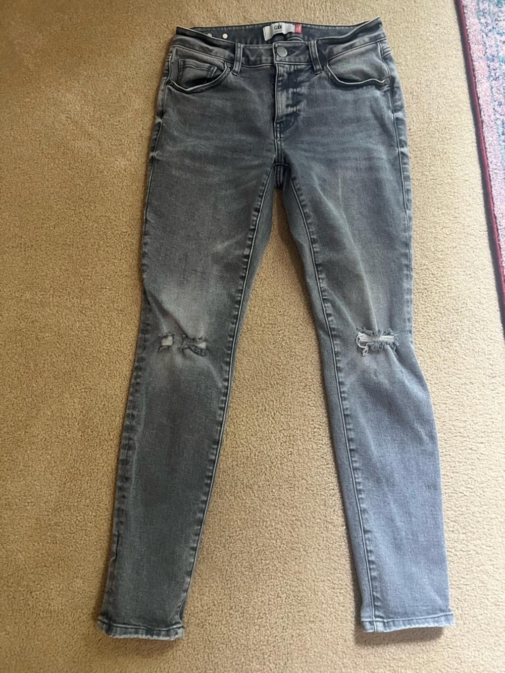 CAbi Women's Faded Gray Skinny Jeans with Knee Distress
